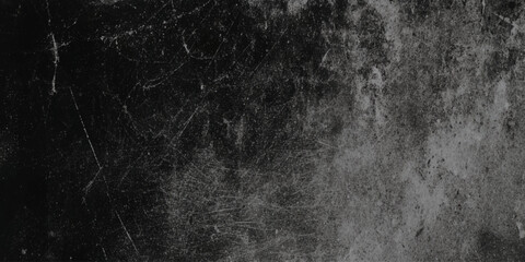 A textured black and white abstract background with grainy details and subtle variations in tone is shown