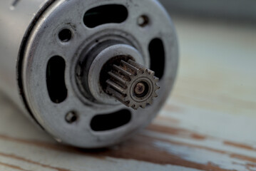 Fragment of electric engine on a wood