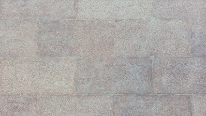 Natural brown and gray granite stone wall texture background. Rough square masonry tiles surface pattern for architecture, flooring, or design backdrop.
