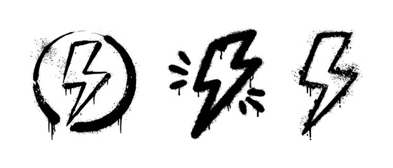 set of black graffiti lightning bolt symbols with spray paint drip texture © HENI
