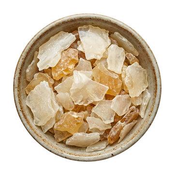 Dried tragacanth gum crystals in ceramic bowl isolated on transparent background