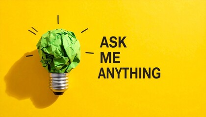 Crumpled green paper forms a light bulb atop a metallic base, radiating lines suggest a bright idea, set against a vibrant yellow background with partial text hinting at “NAME ANYTHING.”