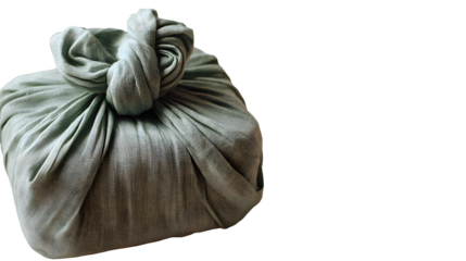 A serene shot of a gift wrapped in the japanese furoshiki cloth on a white background, tied in a knot on top, elegant and simple