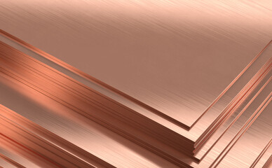 Stacked sheets of copper metal with a smooth and shiny surface at a metalworking site.
