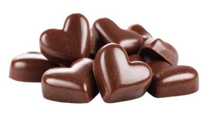 Pile of assorted golden dust gourmet chocolate heart shaped candies on transparent background