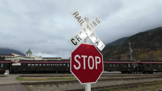 Gimbal close booming down shot of the White Pass Yukon Route Railway crossing in Skagway, Alaska. 4K