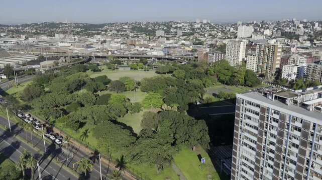 Drone orbits left from east to west side of Albert Park in the early morning on the southeast side of downtown Durban, South Africa
