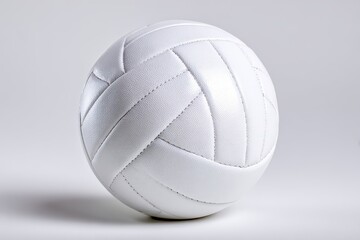 Volleyball leather ball resting on a flat surface ready for play during training or practice sessions at a sports facility or gym