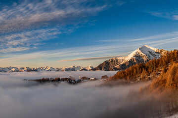 Sunset on Pian delle Betulle with Legnone peak on the horizon, Italy landscape