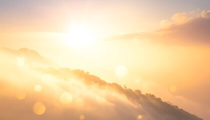 Soft sunlight illuminates misty hills, creating a tranquil atmosphere with a golden glow
