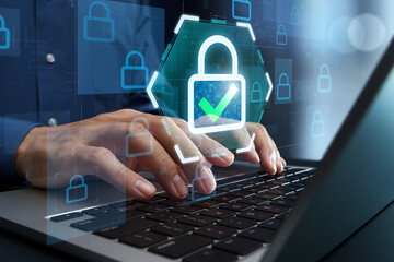 Internet security and secure data encryption. Firewall and networking protection. Zero Trust security and access management. Businessperson using laptop computer.