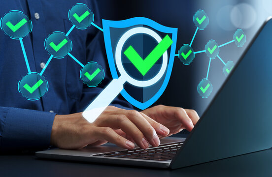 Network security monitoring system. Anomaly detection and security monitoring. Businessman using laptop computer with threat detection system.
