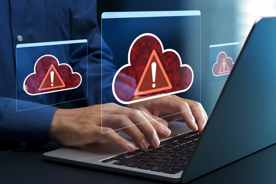 Cloud outage. Incident within cloud infrastructure. Application service unavailable. Businessperson using laptop computer.