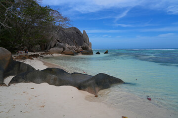 Day view of the Anse Source d Argent beach with its granite boulders on La Digue island in the Seychelles, one of the most beautiful beaches in the world