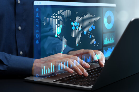 Global business management and data analysis dashboard. World map and statistical graphs. Businessman using laptop computer to analyze reports. - Powered by Adobe