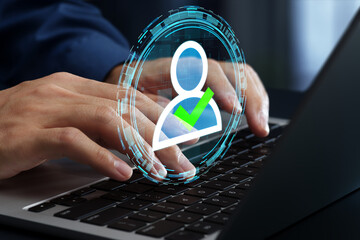 Authentication and identification. Zero trust access control and authorization. Businessperson using laptop computer for identity verification.