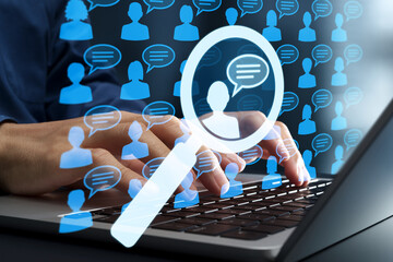 Sentiment analysis and opinion mining. Data analytics using NLP and machine learning. Marketer using laptop computer to detect emotions from social media.