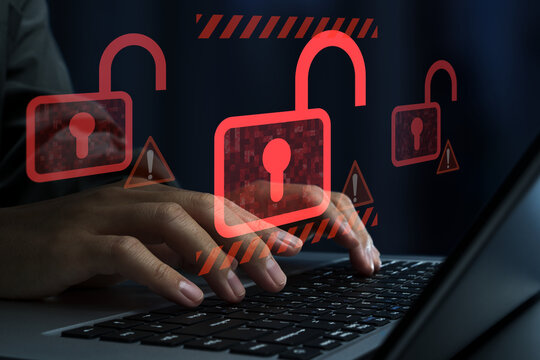 Hacking and system intrusion. Unauthorized access and account takeover. Unlocked padlock icons. Hacker using laptop computer to steal data.