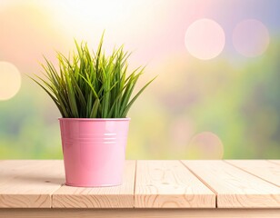 Pink pot of green grass on wood, blurred bokeh background