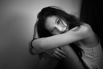 Woman portrait black white moody introspective modern lifestyles habits concepts regarding modern...