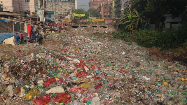 Bridge above contaminated river highlighting severe pollution in Dhaka