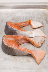 salmon fillets baked until crispy with parsley