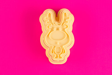 plastic molds for making Christmas cookies on  background