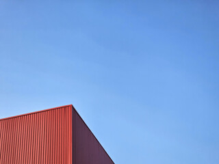 Striking Composition Modern Architecture Showcasing Bold Geometric Lines with a Vivid Blue Sky Backdrop.