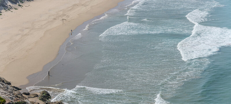 wave froth at Island beach,  Robberg peninsula,  Plettenberg, South Africa
