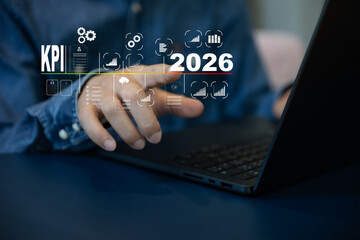 The  business man hold to seek step icon achieve goal and target on year 2026