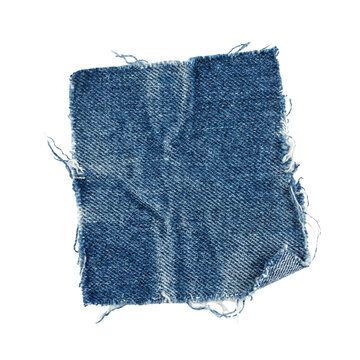 Distressed blue denim fabric patch with frayed edges