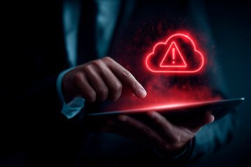 Cybersecurity and data protection concept: a businessperson in a suit interacting with a tablet that displays cloud and warning signs