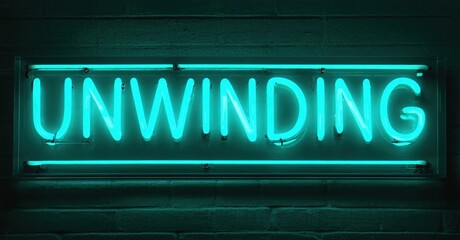 Bright turquoise neon sign spells UNWINDING against dark brick wall. Simple, modern aesthetic. Relaxing vibes emanate from glowing text.