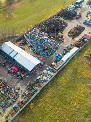 Obraz premium Industrial garbage yard with heavy metal debris