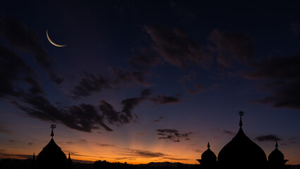Mosques Dome Ramadan Mubarak Background with dark blue twilight sky and Crescent Moon silhouette, symbol islamic religion and free space for text arabic, Eid al-Adha, Eid al-fitr