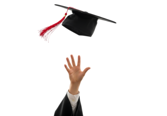 A hand reaches upwards to throw a graduation cap with a red tassel into the air, isolated on transparent background