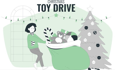 Woman sorting Christmas toys into a large green bin beside a decorated tree