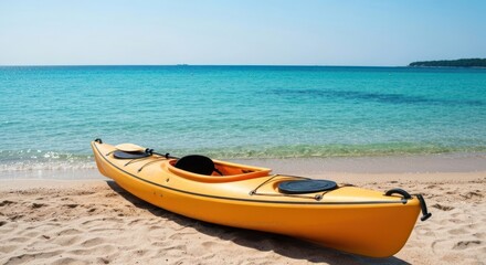 Sunny beach, turquoise water, orange kayak