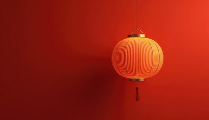 Illuminated paper lantern, orange and gold, hangs against a gradient crimson background