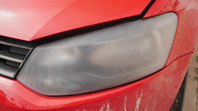 Car headlight after being sanded