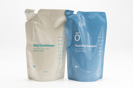 Fuji City, Shizuoka Prefecture, Japan - September 13, 2025: doTERRA shampoo and conditioner refill pouches isolated on white background