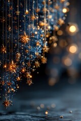 Naklejka premium Golden star ornaments hang in a dark blue background with warm bokeh lights