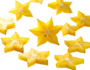 Bright yellow star-shaped fruits isolated against a black background