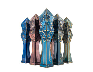 Group of stylized, faceted, totem-like sculptures with geometric gold accents