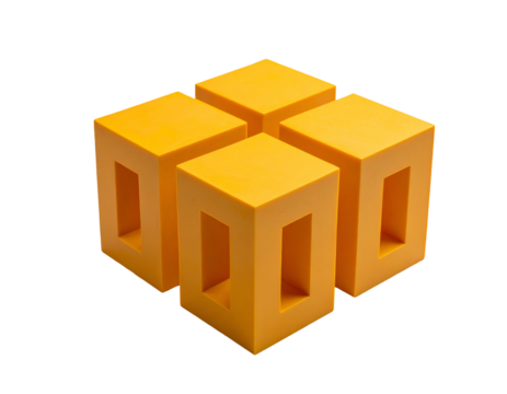 Four connected, yellow geometric cubes with rectangular cutouts on black - Powered by Adobe