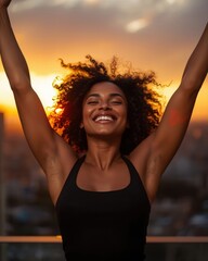Joyful woman celebrating sunset