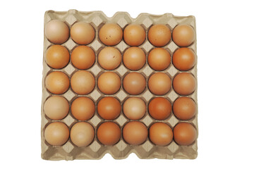Top-down view of thirty brown chicken eggs in a tray isolated on white.