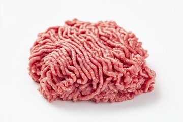 Raw minced beef meat isolated on white background, close-up. Fresh ingredient, cooking preparation, ground meat, food photography, protein source, butcher product.