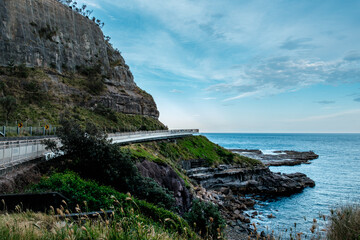 Photo taken at Sea Cliff Bridge in December 2025, showing the iconic coastal bridge and ocean views, with people enjoying walking and sightseeing along the coast.
