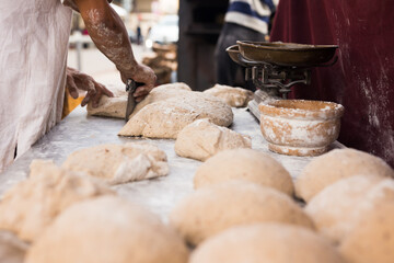 bread preparation. loaves of dough before baking